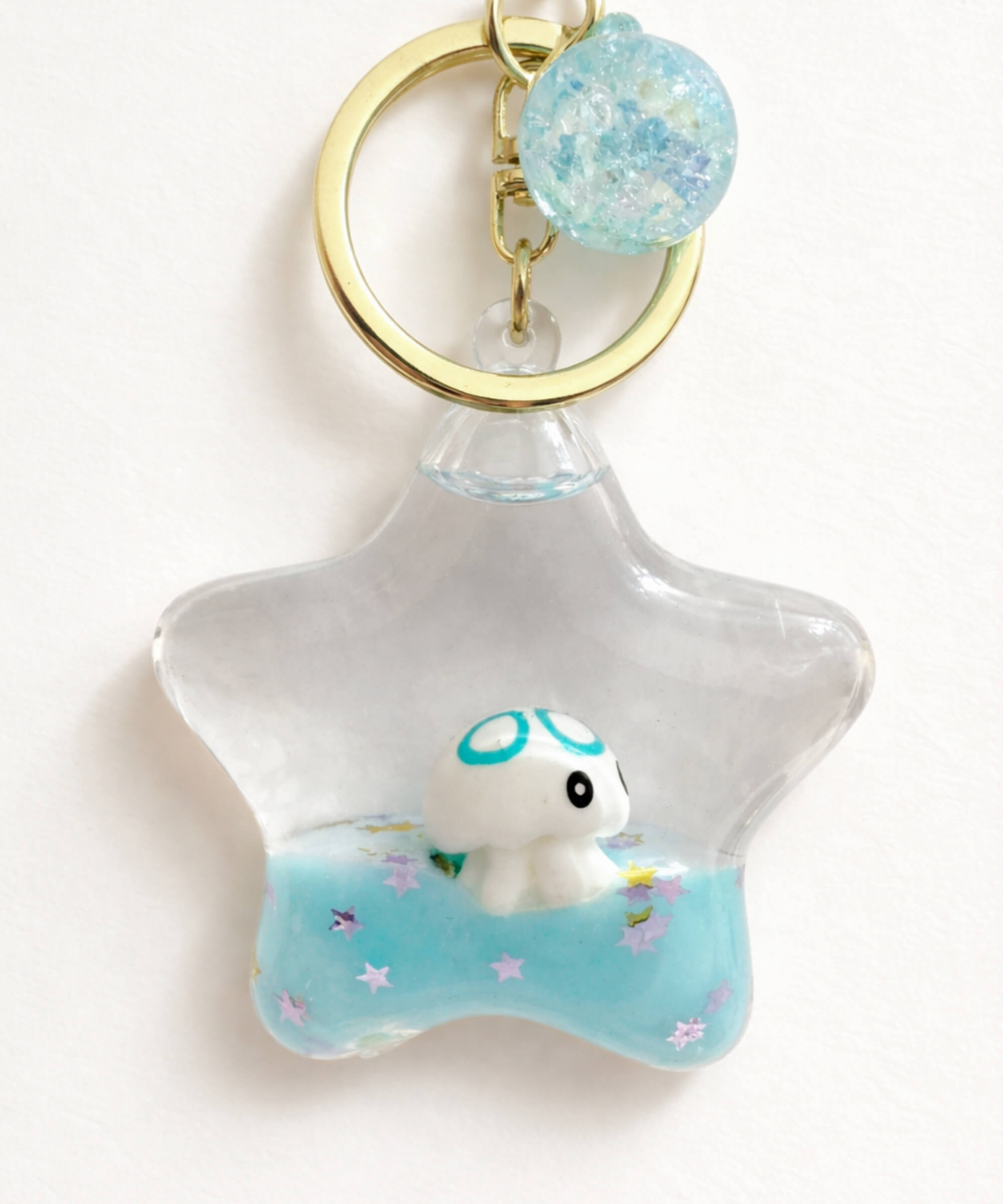 Octopus star liquid glitter keychain blue floating animal charm